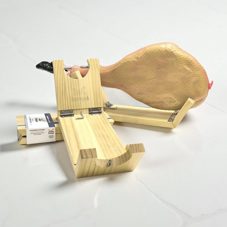 Jamonero plegable Kampé desplegado sobre una superficie clara, listo para colocar la pieza de jamón